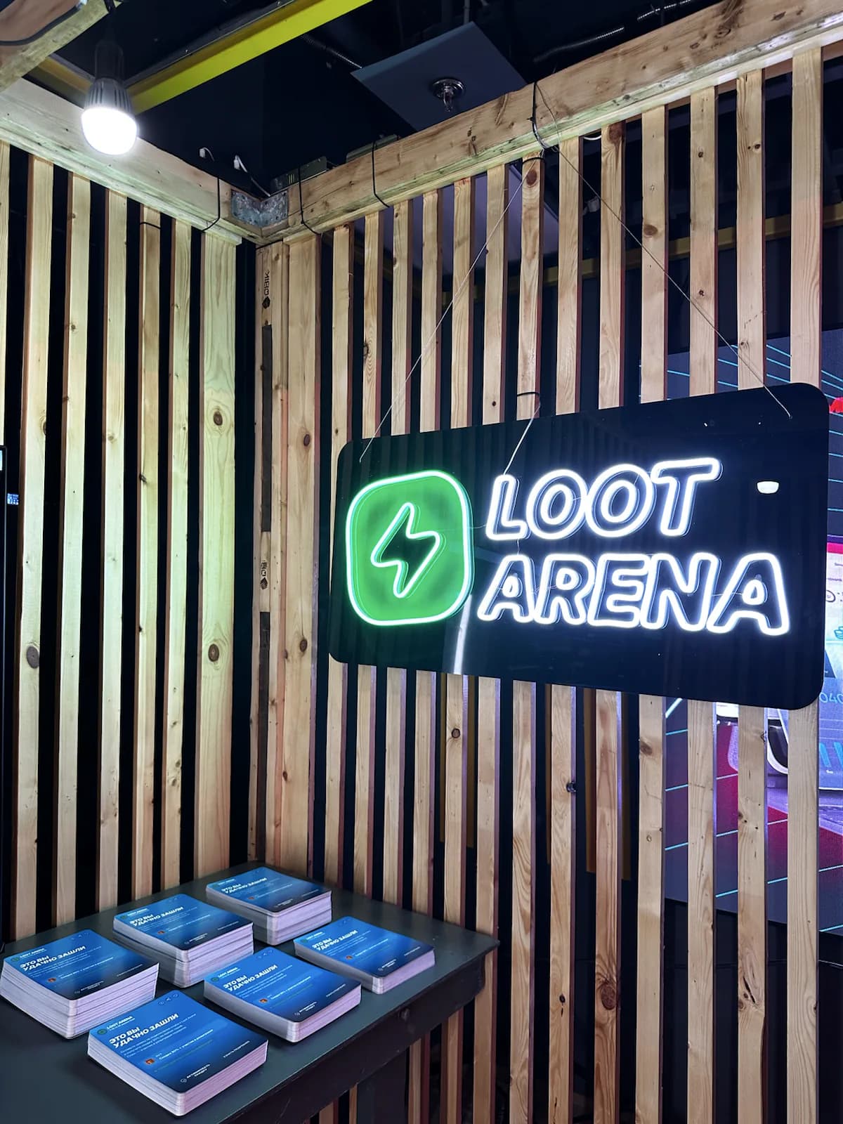 The illuminated Loot Arena sign at the LANGAME 2026 booth
